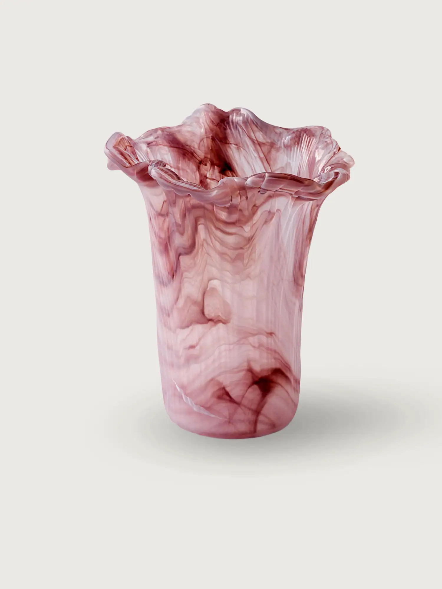 Decorative Marul glass vase with pink and white marbled design.